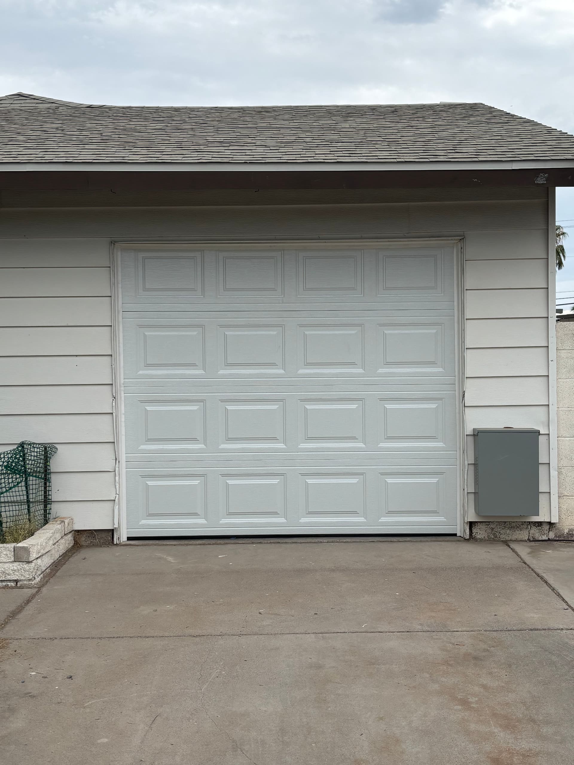 One-Piece to Sectional Garage Door Conversion in Henderson Nevada image